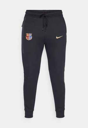 Pantaloni da jogging neri in tessuto morbido con vita elasticizzata e cordino, gambe affusolate, tasche laterali con zip e loghi ricamati in oro e rosso.