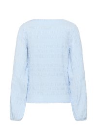 Haut bleu clair à manches longues avec des rayures horizontales en volants texturés et des poignets froncés, montré de dos sur un fond blanc.