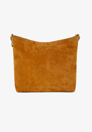 Tan suede shoulder bag with a soft texture, slouchy design, and a simple top opening. Features a subtle embossed logo and brass hardware.