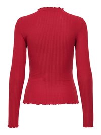 Haut rouge à manches longues côtelé avec une silhouette ajustée, un ourlet et des poignets à bord ondulé, et un col légèrement froncé.