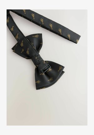 Sort butterfly slips med guldtræ-mønster, lavet af glat stof. Har en spænde til justering og en pænt bundet slipsform.