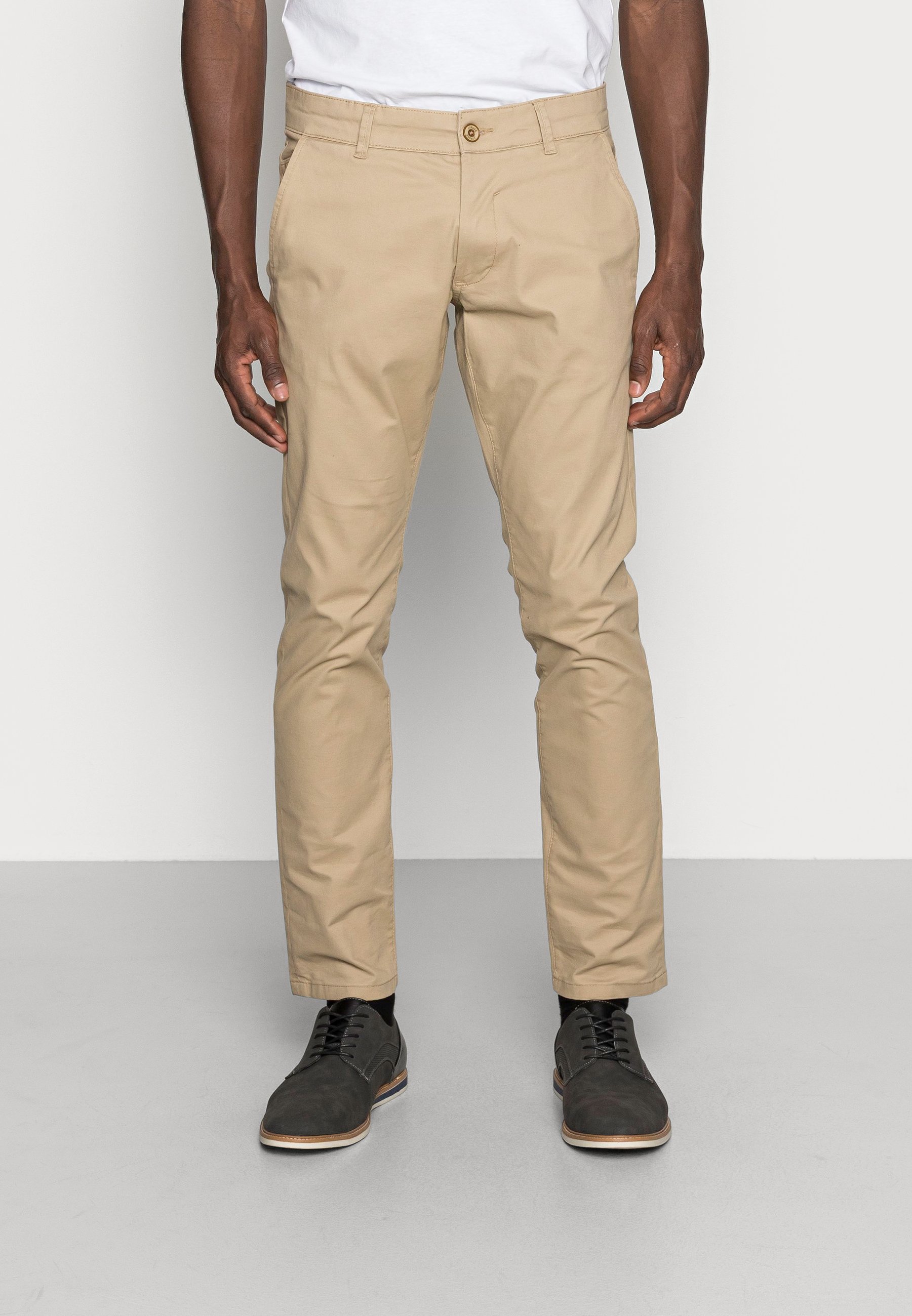 pantaloni beige