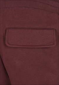 Urban Classics Pantaloni cargo - cherry