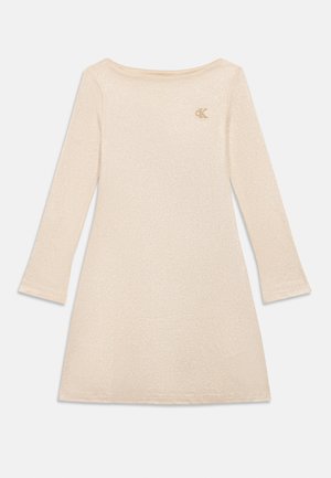 Long-sleeve dress in light beige with a subtle shimmer. Features a boat neck and a small CK logo in the upper left corner. Soft, textured fabric.