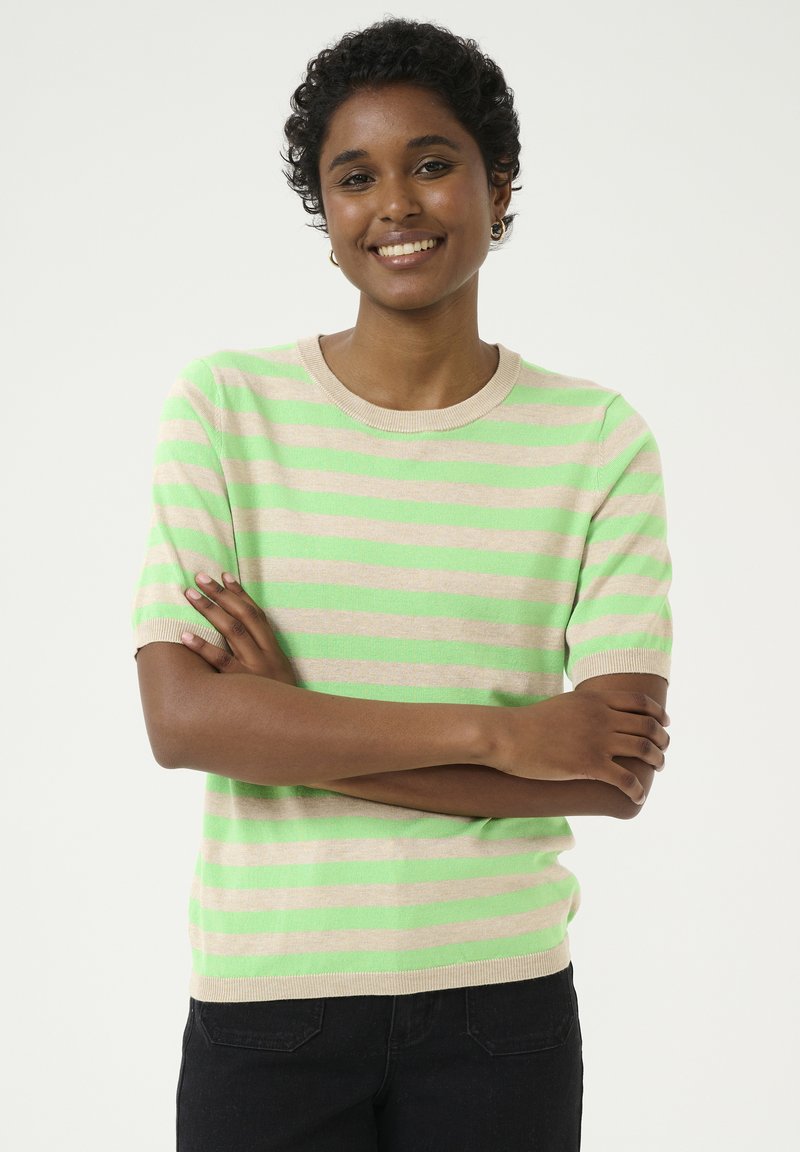 Short-sleeve sweater in light beige with bright green stripes. Features a round neckline and soft knit texture.