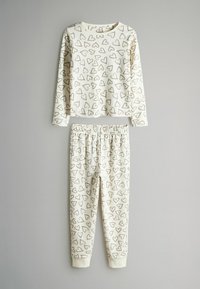 Kinder-Pyjama-Set mit langärmligem Oberteil und Hose aus weichem Baumwollmaterial, cremefarbenem Hintergrund mit braunem Herzmuster, elastischem Bund.