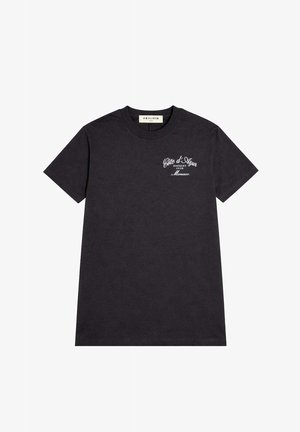 T-shirt noir à manches courtes avec texte blanc « Côte d'Azur Racquet Club Monaco » sur la poitrine gauche et col rond.