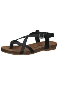 Sandalia de cuero negra con correas entrelazadas, plantilla de corcho y hebilla ajustable en el tobillo. Suela plana para estabilidad y comodidad.