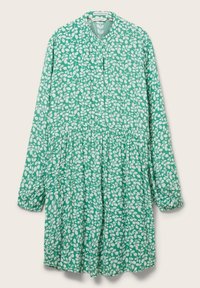 Robe longue verte à manches longues avec motif botanique blanc, boutonnage sur le devant, taille froncée et poignets élastiques aux manches.