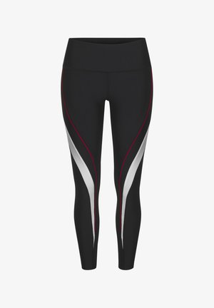 Črne atletske legice s kontrastnimi belimi in rdečimi ukrivljenimi paneli, visokim pasom in gladkim, raztegljivim materialom.