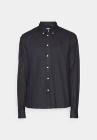 Camicia in denim scuro con colletto, maniche lunghe e bottoni color oro. Presenta un piccolo logo ricamato sul petto.