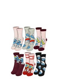 Quattro paia di calzini con personaggi dei cartoni animati, tra cui i puffi blu. I colori includono rosa, grigio, bordeaux e nero con vari motivi.