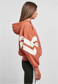 Urban Classics CRINKLE BATWING - Training jacket - terracotta whitesand