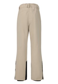 Beige Skihosen mit hohem Taillenbund, weit ausgestellten Beinen, schwarzen Akzenten an den Säumen und seitlichen Belüftungsöffnungen. Glattes, wasserabweisendes Material.