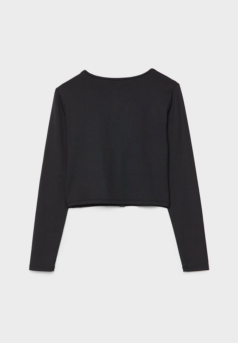 Haut cropped noir à manches longues avec un col rond, présenté à plat sur un fond blanc.