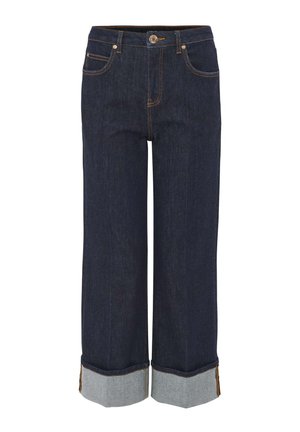 Donkerblauwe spijkerbroek met een losse pasvorm, voorzien van een omgeslagen zoom in lichtblauwe denim, contrasterende stiksels en zijzakken.