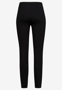 Black leggings with a smooth texture, elastic waistband, and a fitted design. No visible patterns or adornments; contemporary style.