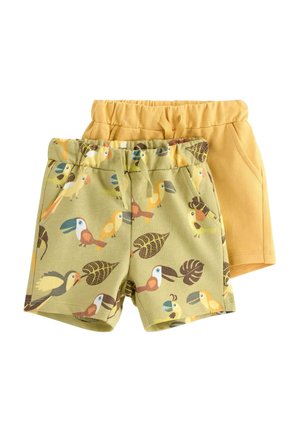 To par børne-elastikshorts med høj talje, den ene ensfarvet i sennepsgul og den anden grøn med tegneserie-tukan og bladprint.