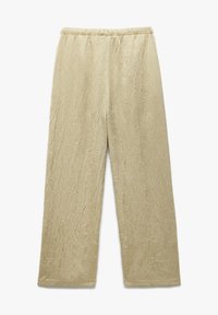 Lichtbeige, cropped broeken van textuurstof met een gekreukt patroon. Elastische tailleband en wijde pijpen voor comfort.