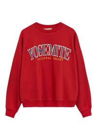 Rode sweatshirt met ronde hals, oversized pasvorm. Het heeft een grafische print met de tekst "YOSEMITE NATIONAL VALLEY" in wit en geel.