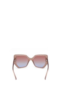 Lunettes de soleil octogonales avec une monture translucide marron clair, verres dégradés passant du rose au bleu, avec une texturation subtile sur la monture.