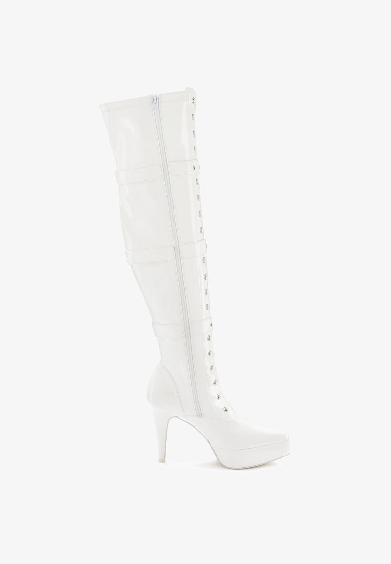 White over-the-knee boots made of glossy patent material, featuring a lace-up front, zipper closure, and a stiletto heel.