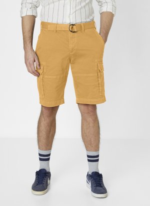 Yellow cargo shorts with multiple pockets, a belt loop and a matching belt. Pair with gray athletic socks and dark blue sneakers.