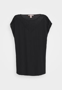 Svart kortärmad topp med V-ringning och spetstyg på axlarna. Tillverkad av mjukt material, med lös passform och rundad nederkant.