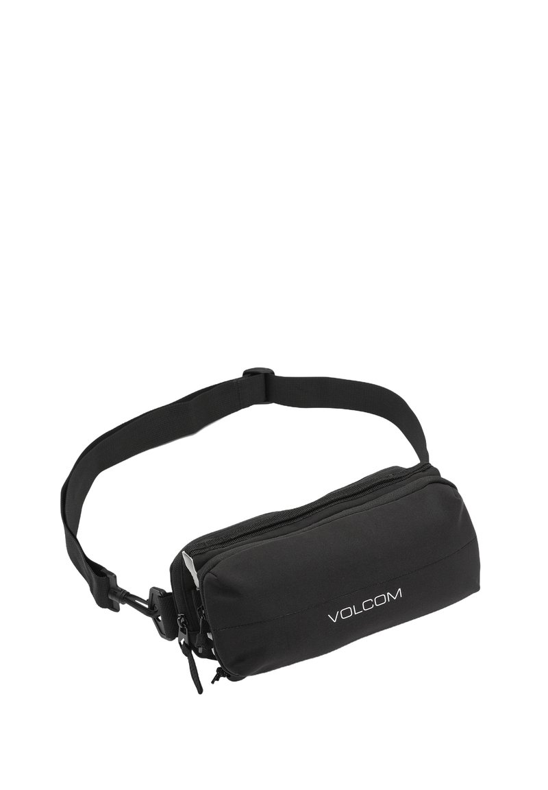Sac à taille noir réglable avec deux compartiments zippés et logo "VOLCOM" blanc sur la poche avant.