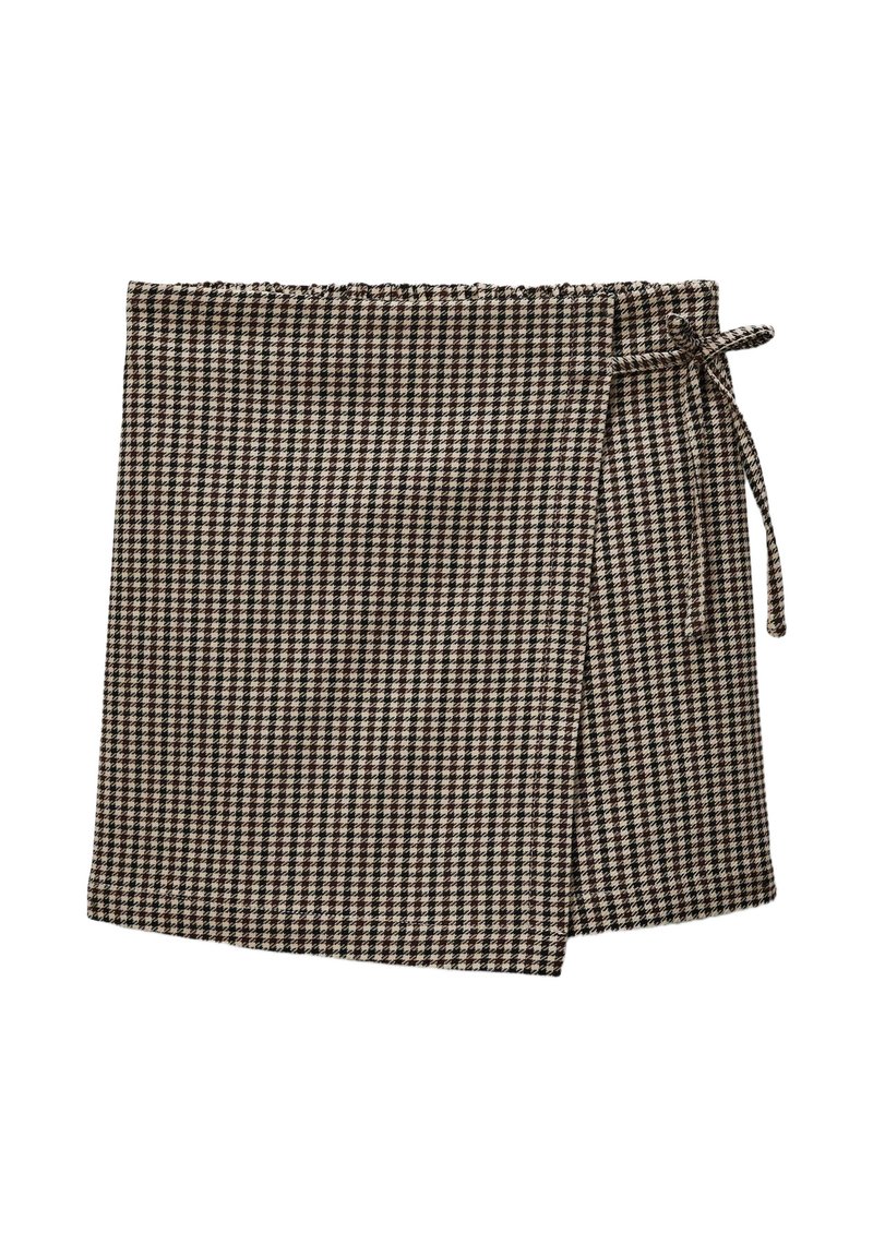 Jupe portefeuille écossaise marron et beige avec un détail de nœud sur le côté, disposée à plat sur un fond blanc.