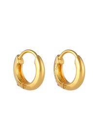 Guldörhängen i form av hoops med en slät, rundad design och en gångjärnsstängning. Påfallande textur och värme med en glänsande yta.