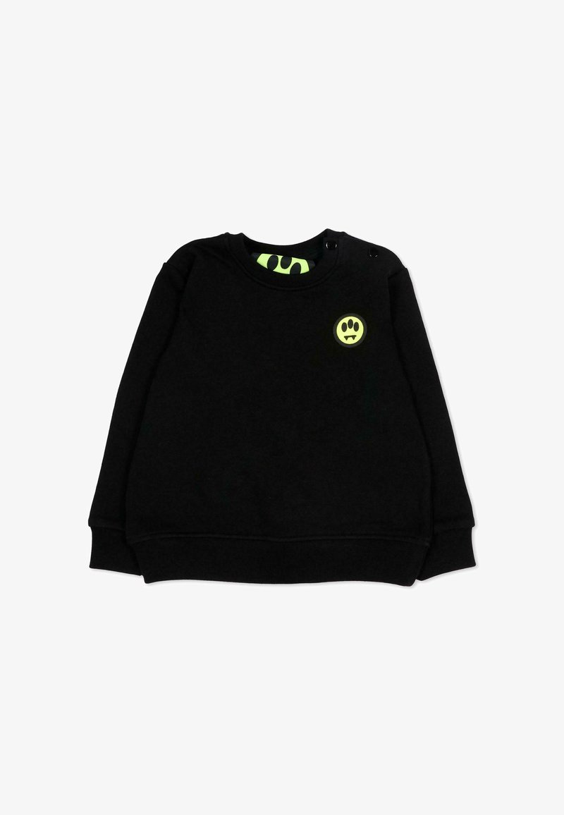 Zwart sweatshirt met lange mouwen en een neongeel vampieren-smiley-patch op de linkerborst, en bijpassende neondetails aan de binnenkant van de kraag.
