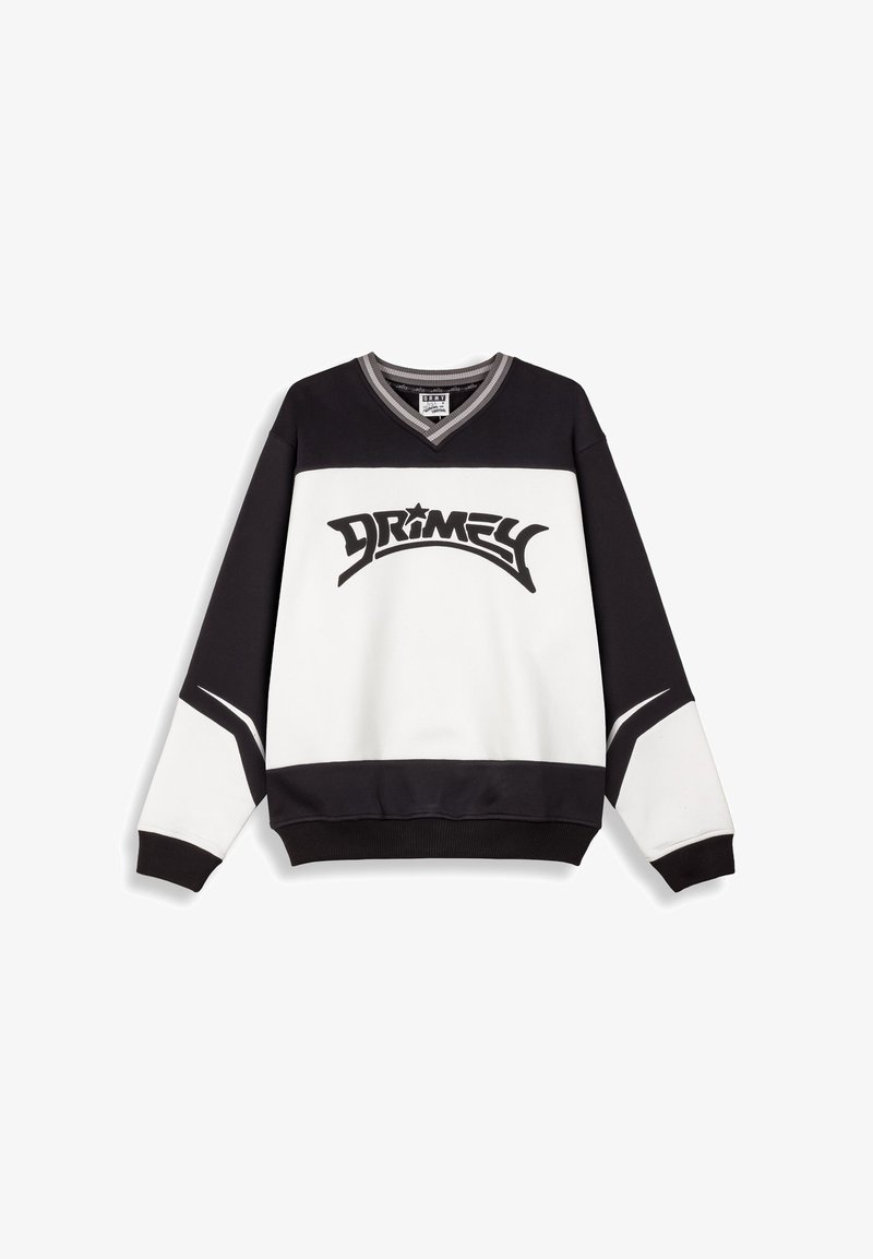 Sudadera en blanco y negro con cuello en V, de manga larga, que presenta un destacado logo negro en la parte frontal y diseños deportivos en los acentos.