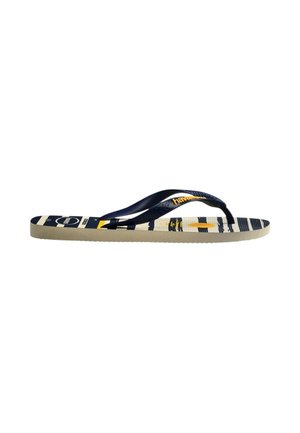 Slippers met marineblauwe banden en een beige zool; voetbed met blauwe en gele horizontale strepen en bedrukte branding.