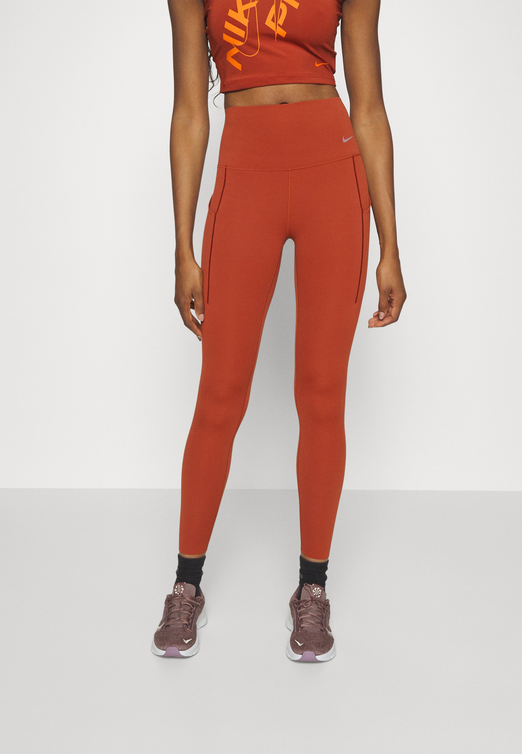 Nike Performance UNIVERSA - Leggings - rugged orange/black/orange