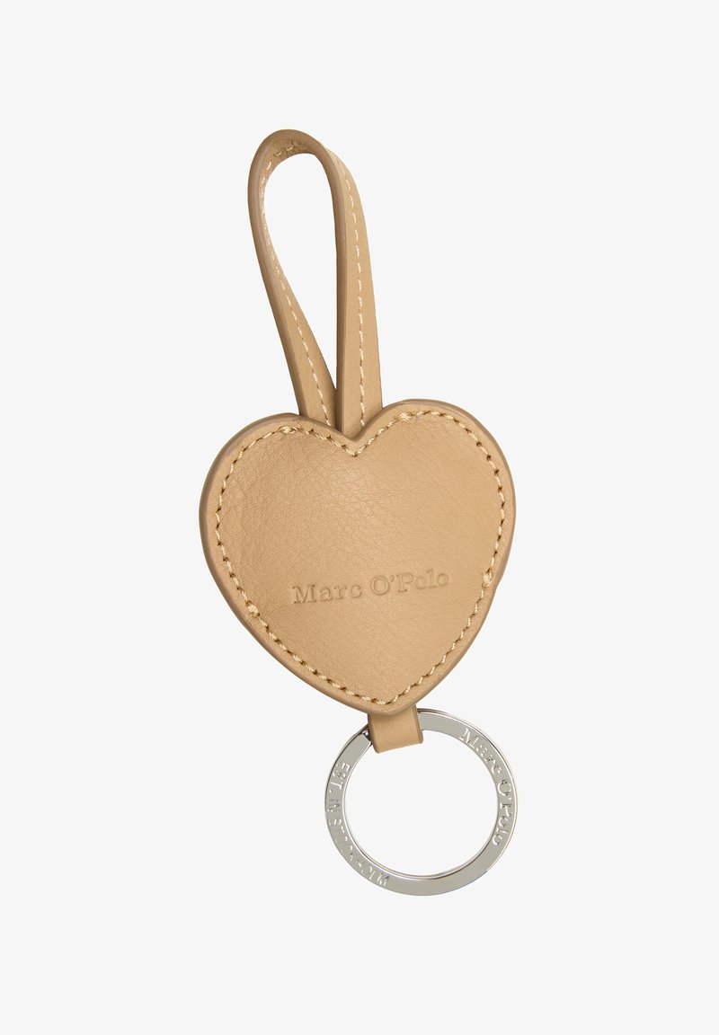 Heart-shaped keychain made of tan leather, featuring contrasting stitching and embossed brand name. Includes a silver metal key ring.
