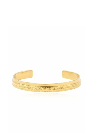 Bracelet manchette ouvert en or avec deux lignes parallèles texturées sur sa surface extérieure.