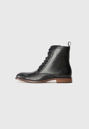 Stivaletti stringati - black