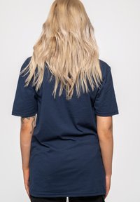 Paradiso Clothing NIRVANA YELLOW SMILEY - Print T-shirt - blue