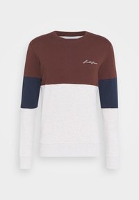 Brun, marinblå och ljusgrå färgblockerad sweatshirt. Rund hals, långa ärmar och en liten vit logotyp på bröstet. Tillverkad av mjukt tyg.