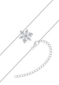 Sølv kædearmbånd med en blomstdesign prydet med flere klare ædelstene. Inkluderer en krabbeclasp og justerbare kædelinker.
