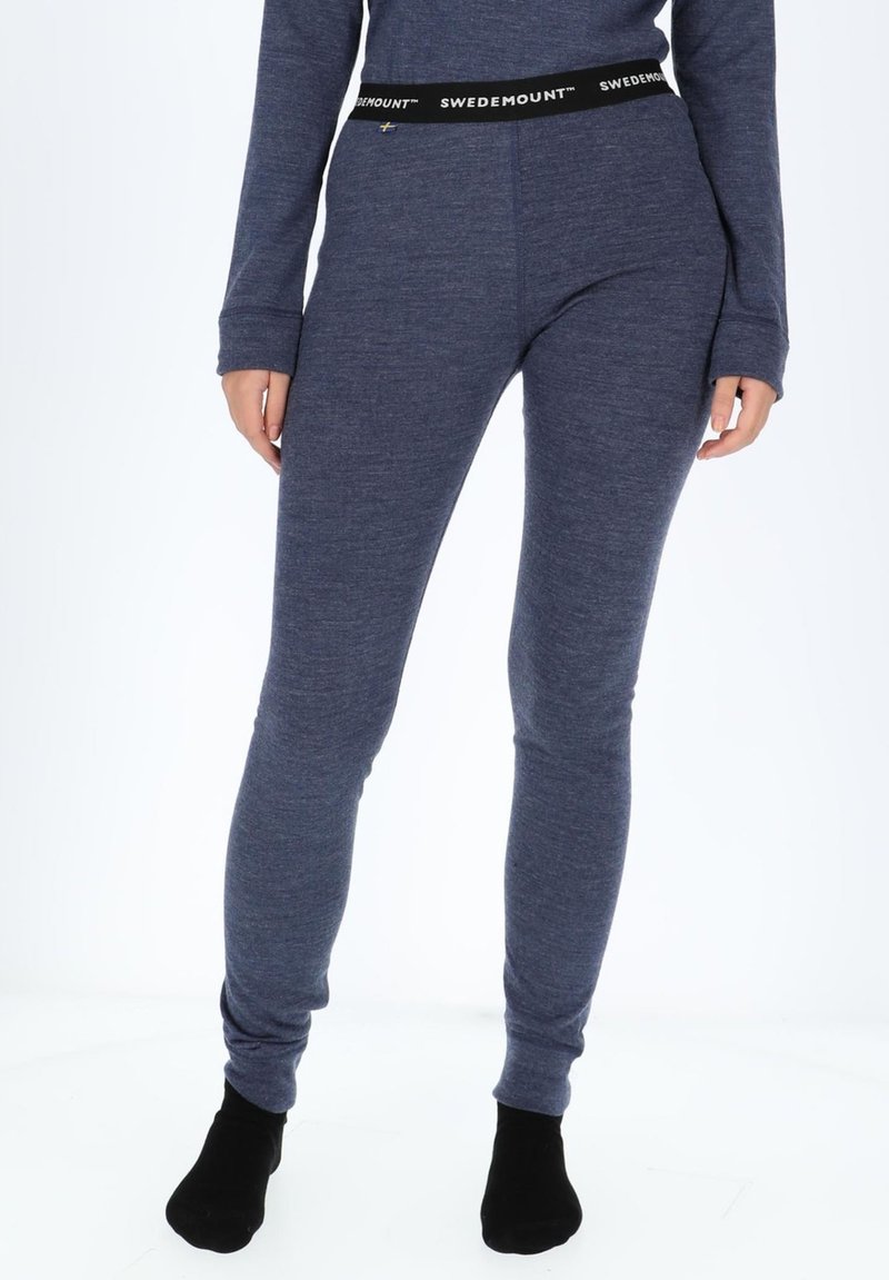 Marineblå leggings med en tætsiddende pasform, lavet af blødt materiale, med en sort elastik i taljen med "SWEDEMOUNT" tekst og minimal tekstur.