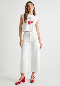 Koton HIGH WAIST  - Flared-farkut - off white