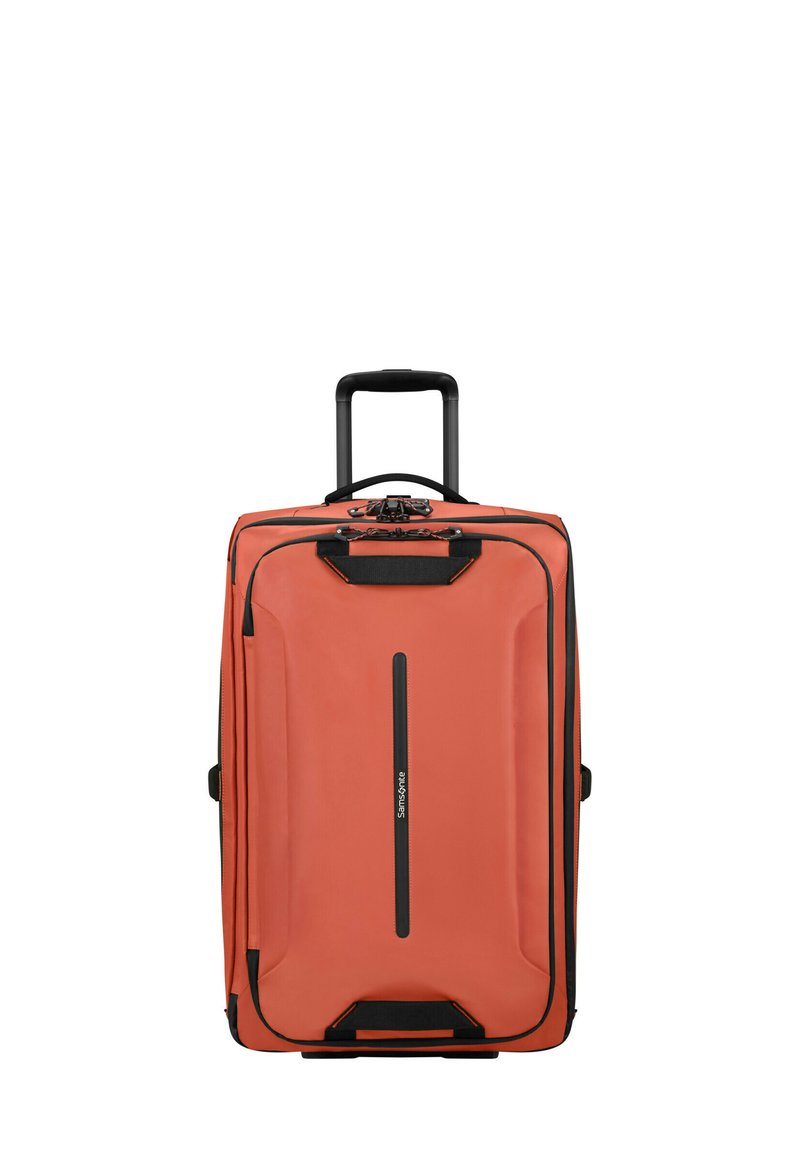Hard-shell luggage in orange with black accents, featuring a retractable handle, zipper closure, and front logo. Rectangular design with textured surface.