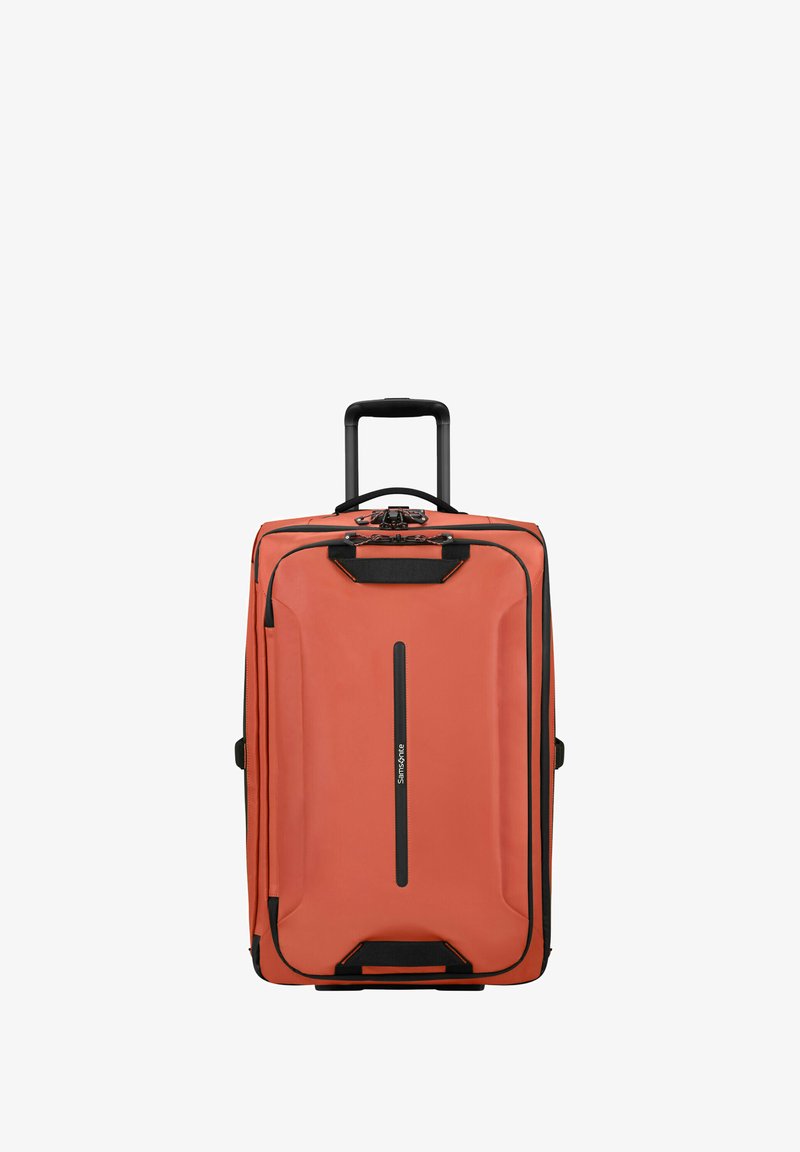 Hard-shell luggage in orange with black accents, featuring a retractable handle, zipper closure, and front logo. Rectangular design with textured surface.