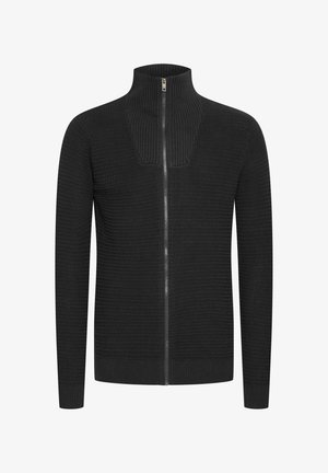 Fekete kötött, cipzáras pulóver magas gallérral, texturált mintával és karcsú szabással. Fém cipzár fut le az elülső részen.