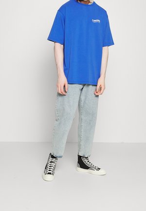 WRSTBHVR T-shirt con stampa - blue