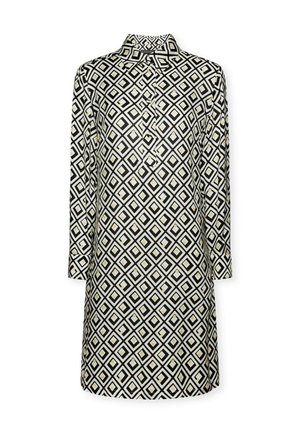 Černobílá košile se vzorem, která má geometrický diamantový design, dlouhé rukávy a mandarinový límec s knoflíkovou légou.