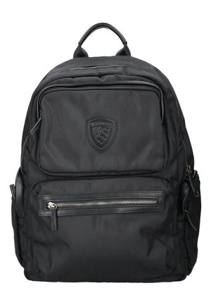 Black nylon backpack with multiple zippered compartments, textured surface, top handle, and a logo patch on the front.