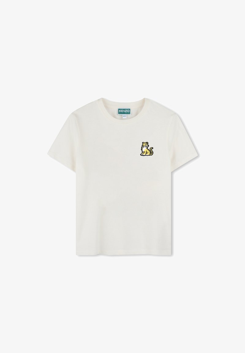 Maglietta in cotone bianca con scollo rotondo, maniche corte e un design di tigre ricamato giallo sul lato sinistro del petto.